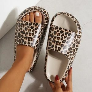 Leopard Print slide. Brand new. Still in original packaging.